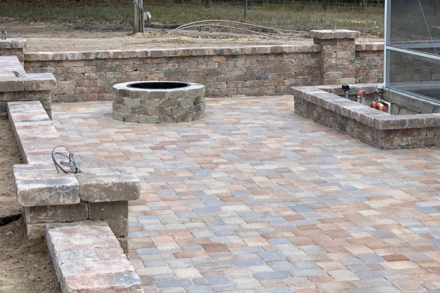 outdoor living area with multi colored earth tone hardscape